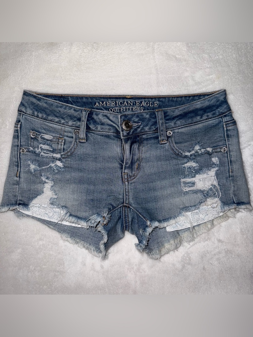 American Eagle Outfitters Light Blue Denim Shorts with lace trim pockets size 0